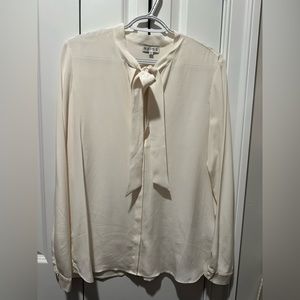 Ladies blouse with tie up collar detail